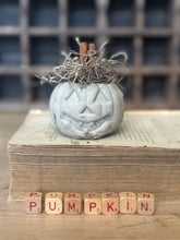 Load image into Gallery viewer, Concrete Spanish Moss and Cinnamon Stick Jack O lantern Pumpkin
